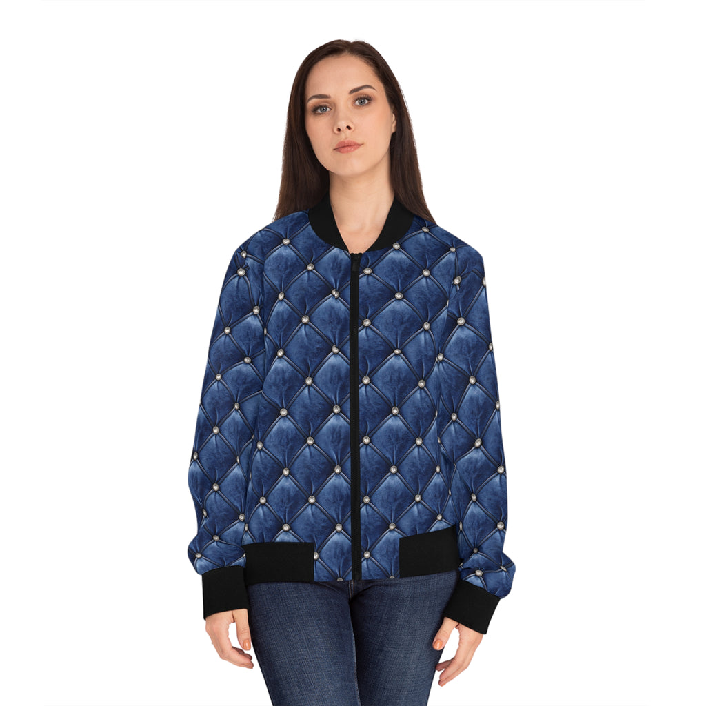 Model wearing  a blue faux tufted bomber jacket on a white background.