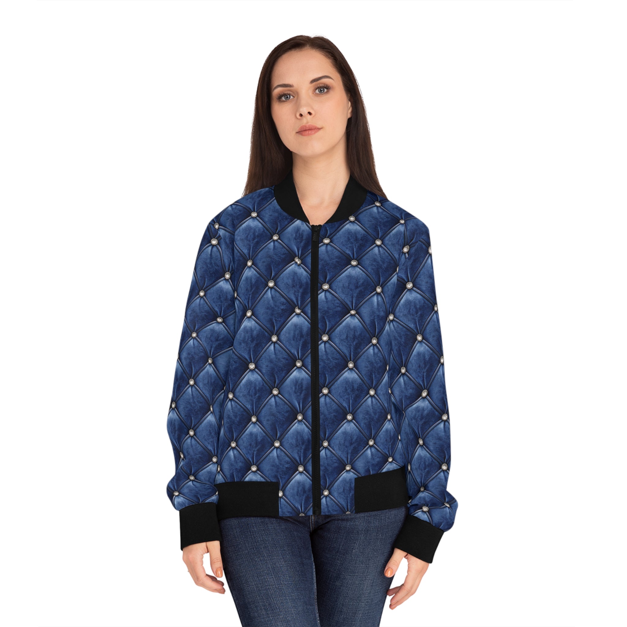 Model wearing  a blue faux tufted bomber jacket on a white background.