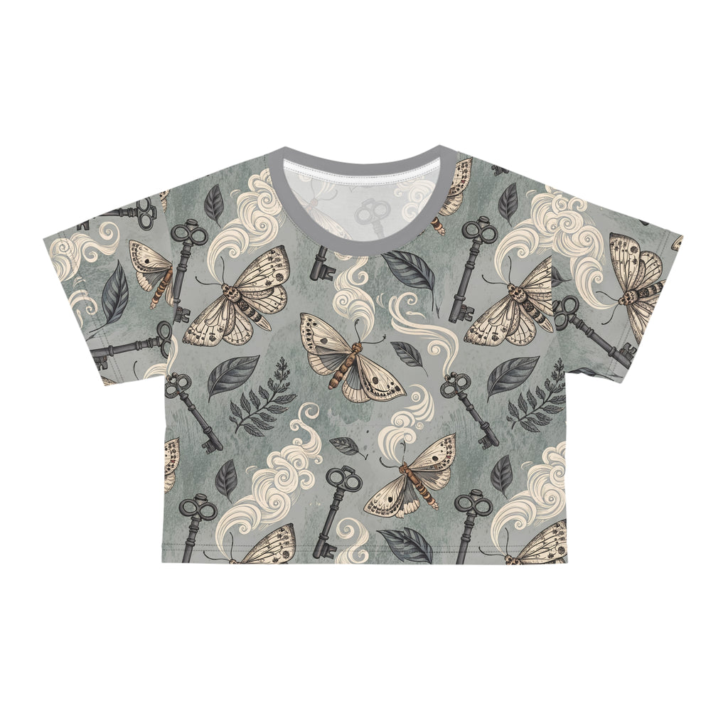 T-shirt with moth and key pattern on a gray background