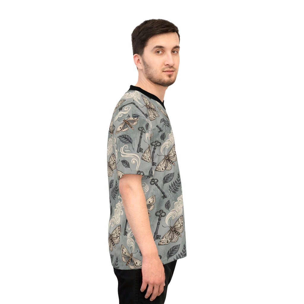 Man wearing a patterned shirt on a white background