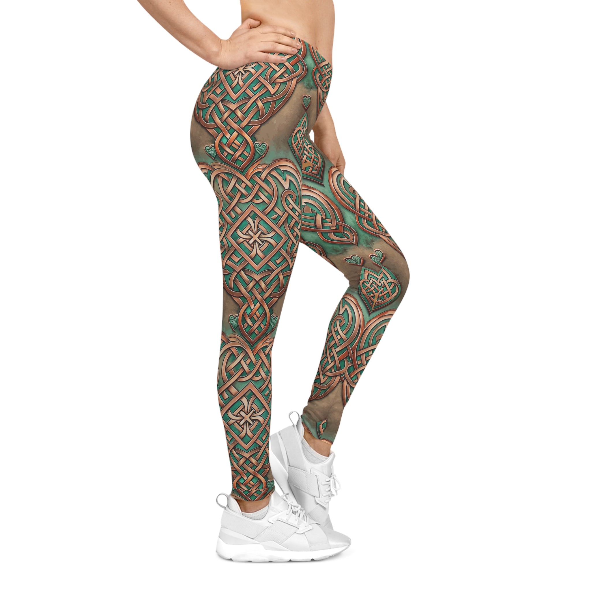 Leggings with a Celtic knot pattern worn by a person on a white background