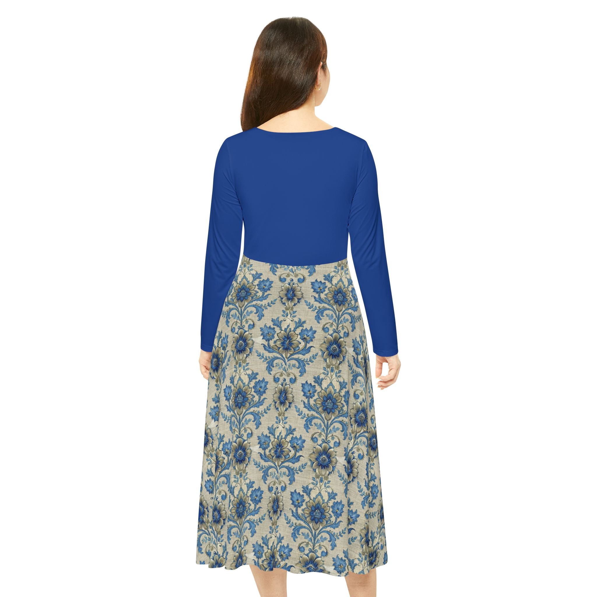 Model wearing a blue Victorian print dress on a white background