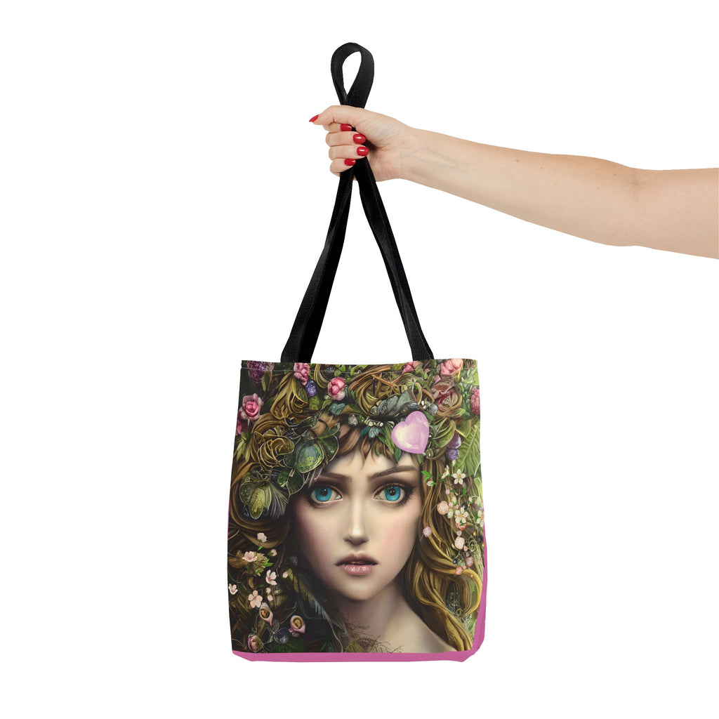 Tote bag with a design of a woman's face surrounded by flowers and leaves