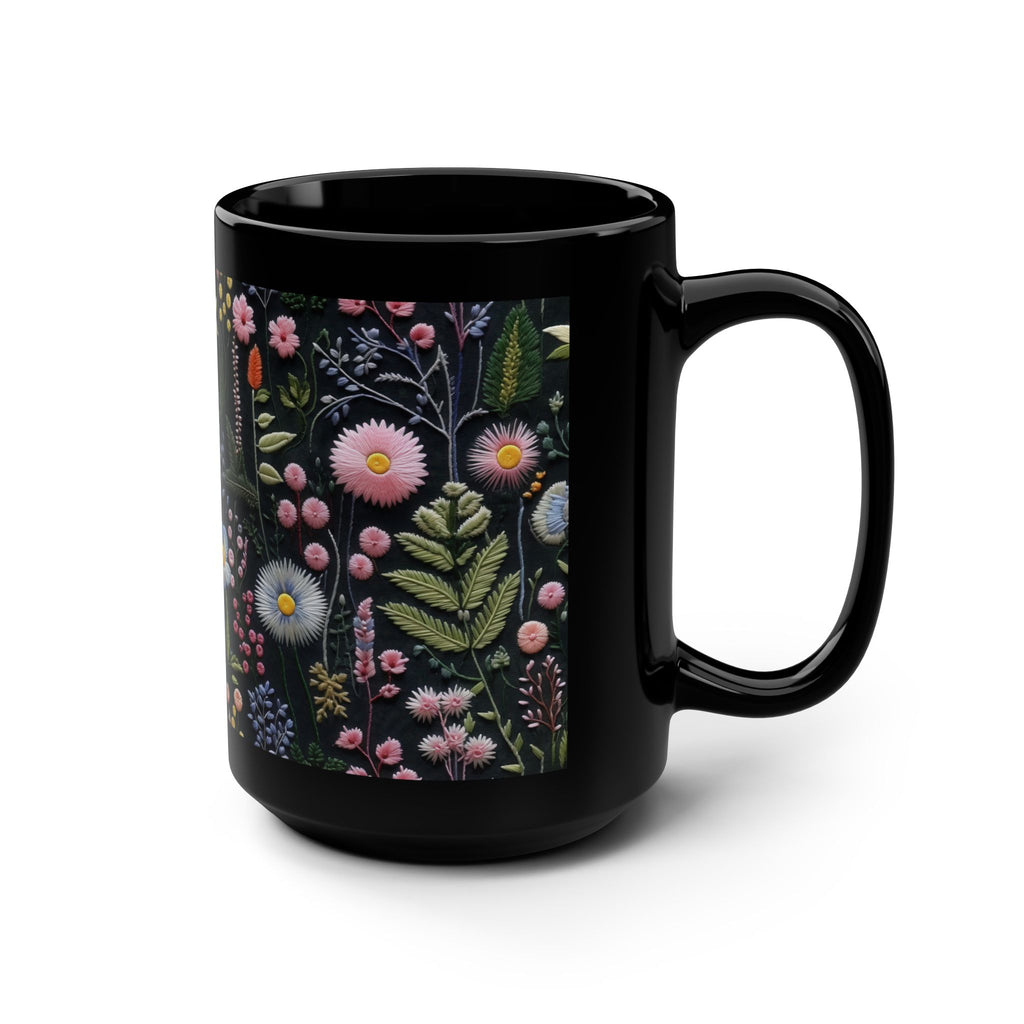 Black mug with floral design on a white background