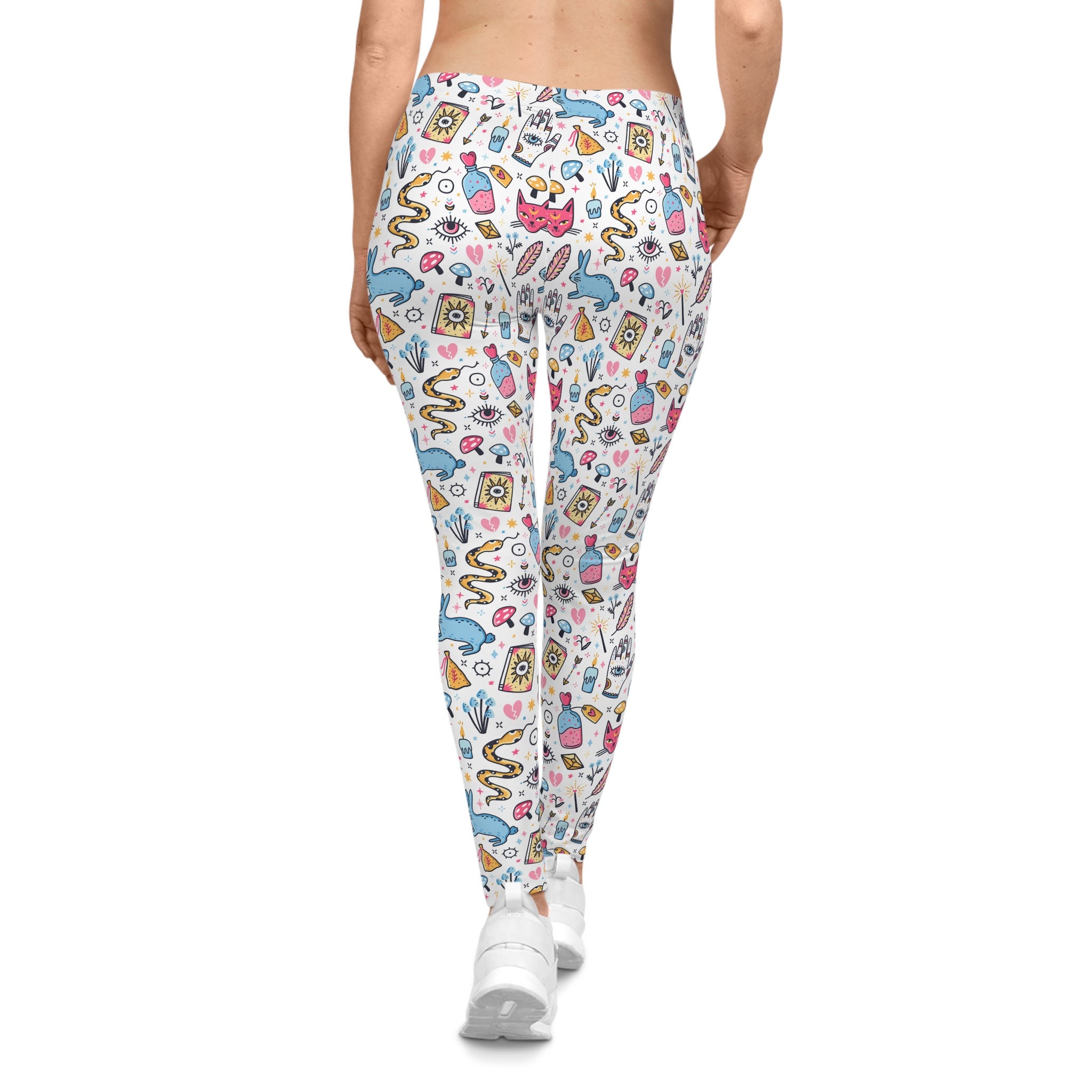 Colorful patterned leggings worn by a person on a white background