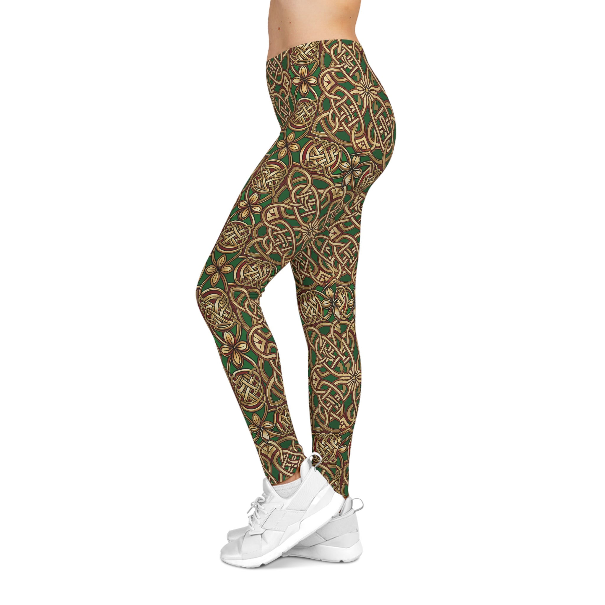 Leggings with a green and brown pattern worn by a person on a white background