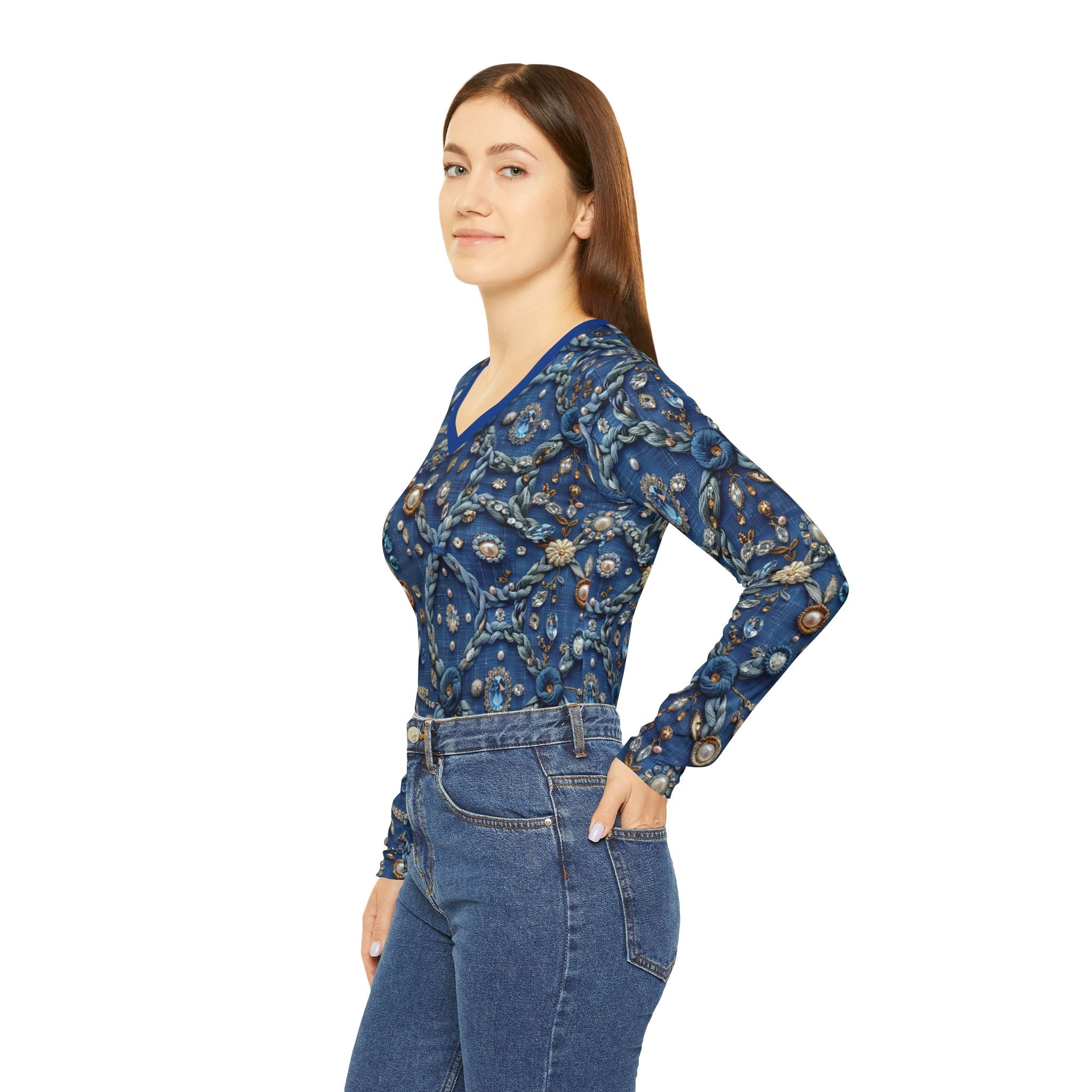 Woman wearing a blue floral blouse and jeans on a white background