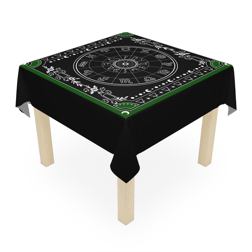 Decorative tablecloth with astrological symbols on a black background