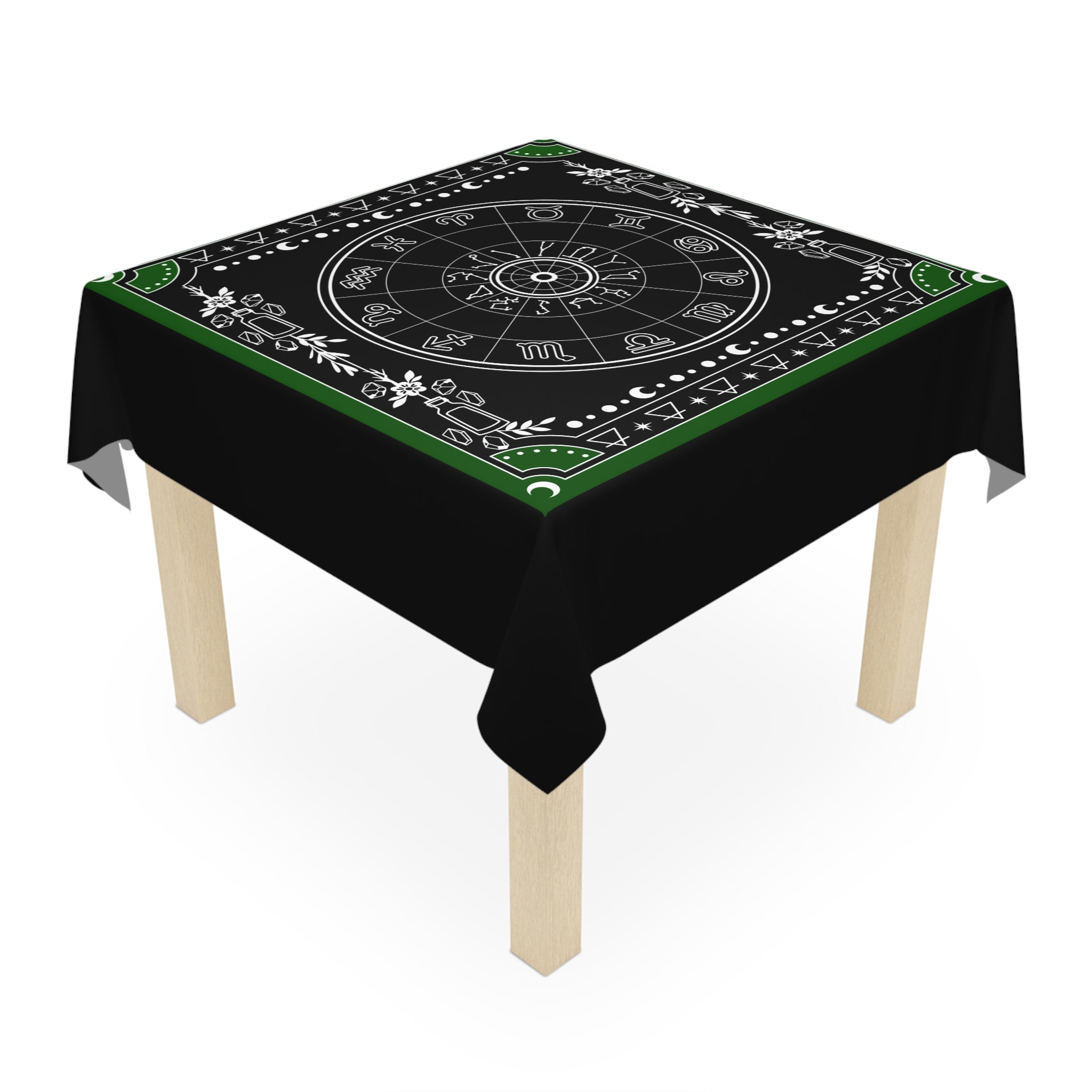 Decorative tablecloth with astrological symbols on a black background