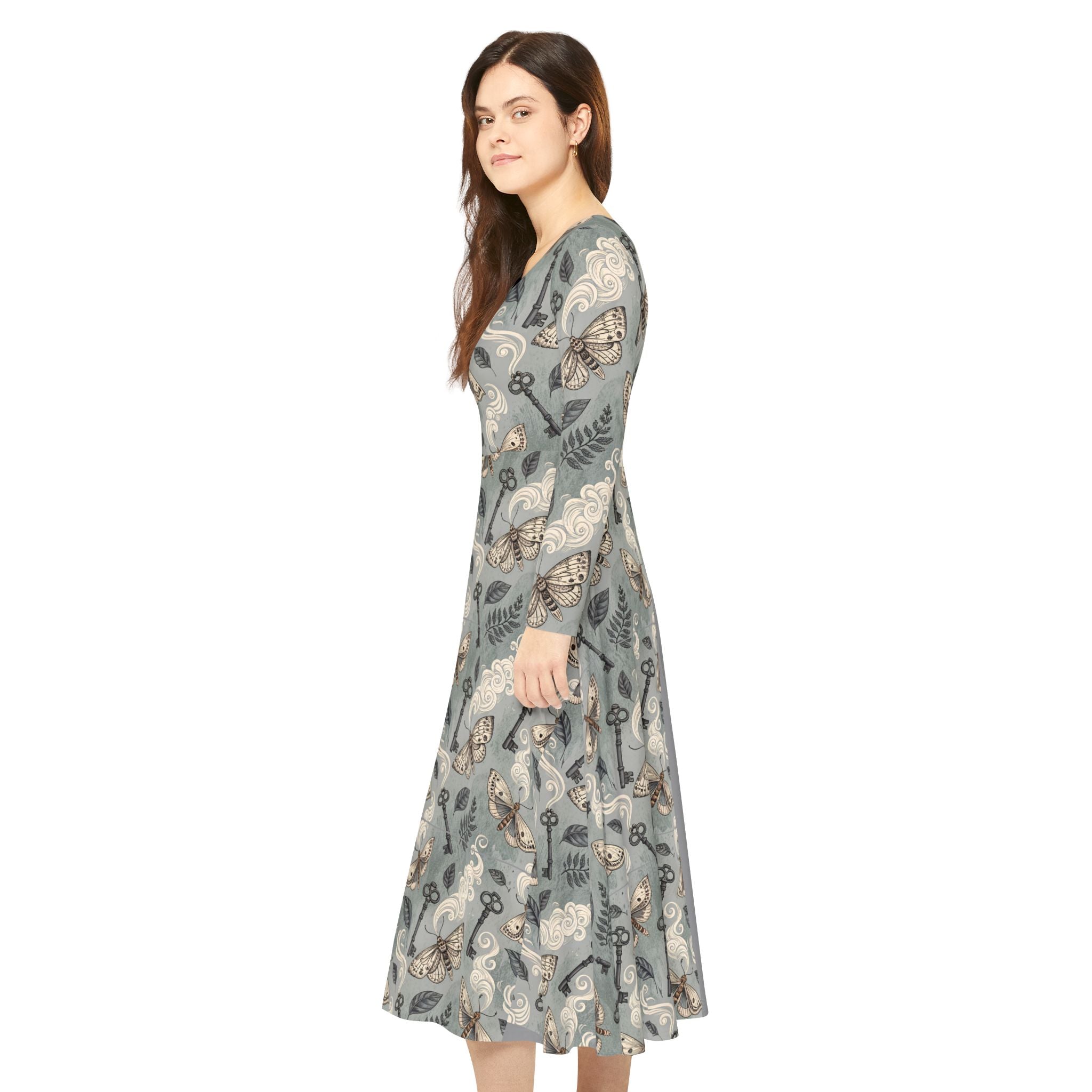 Woman wearing a patterned dress on a white background