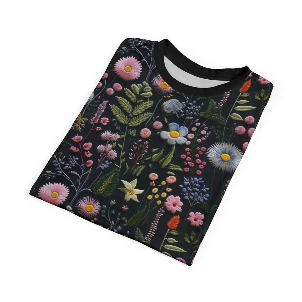 Folded floral patterned t-shirt on a white background