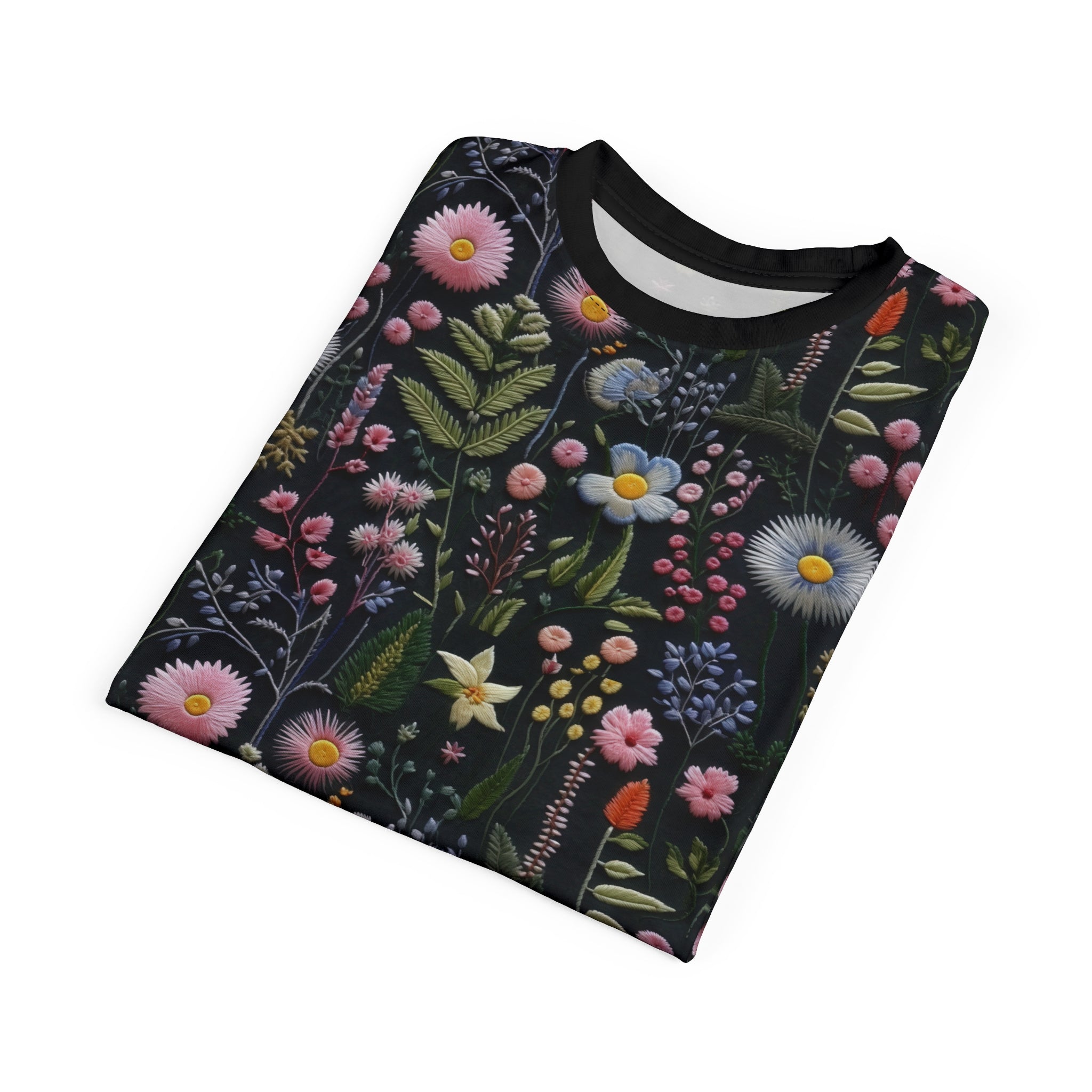 Folded floral patterned t-shirt on a white background