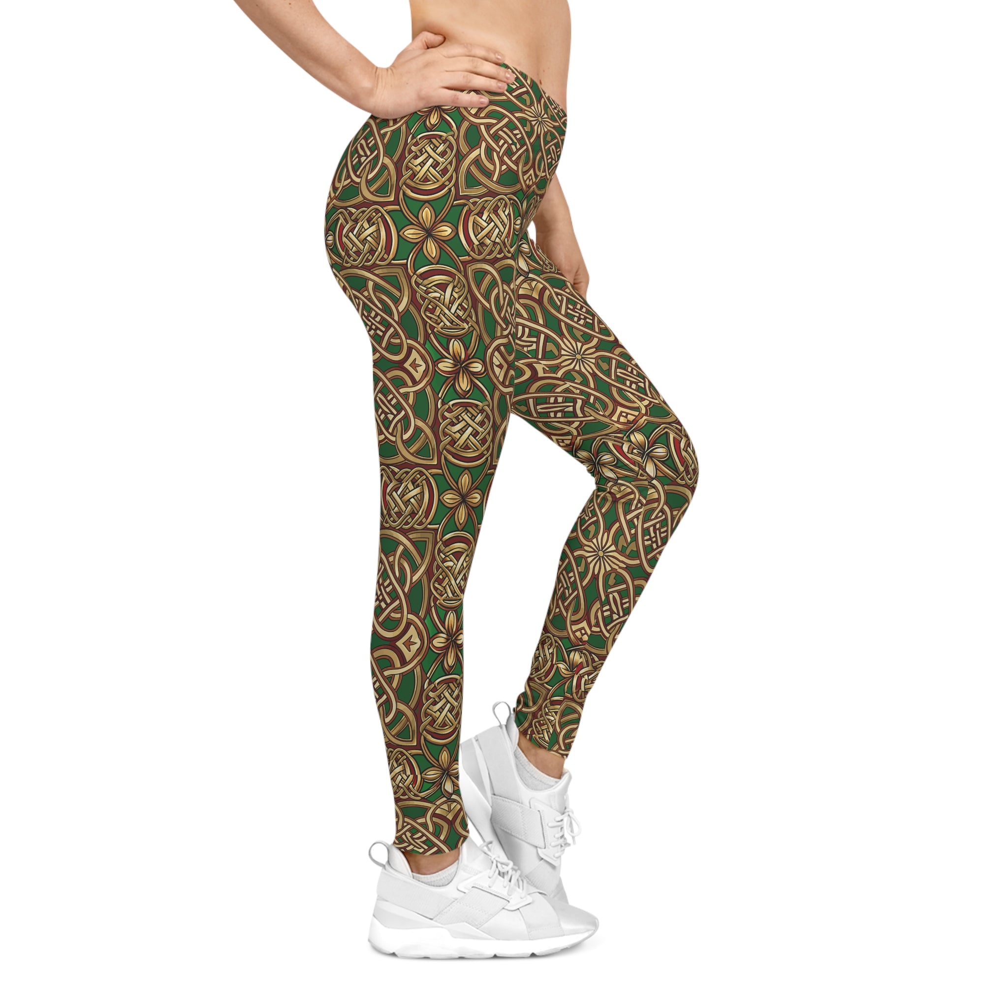 Leggings with a green and brown pattern worn by a person on a white background