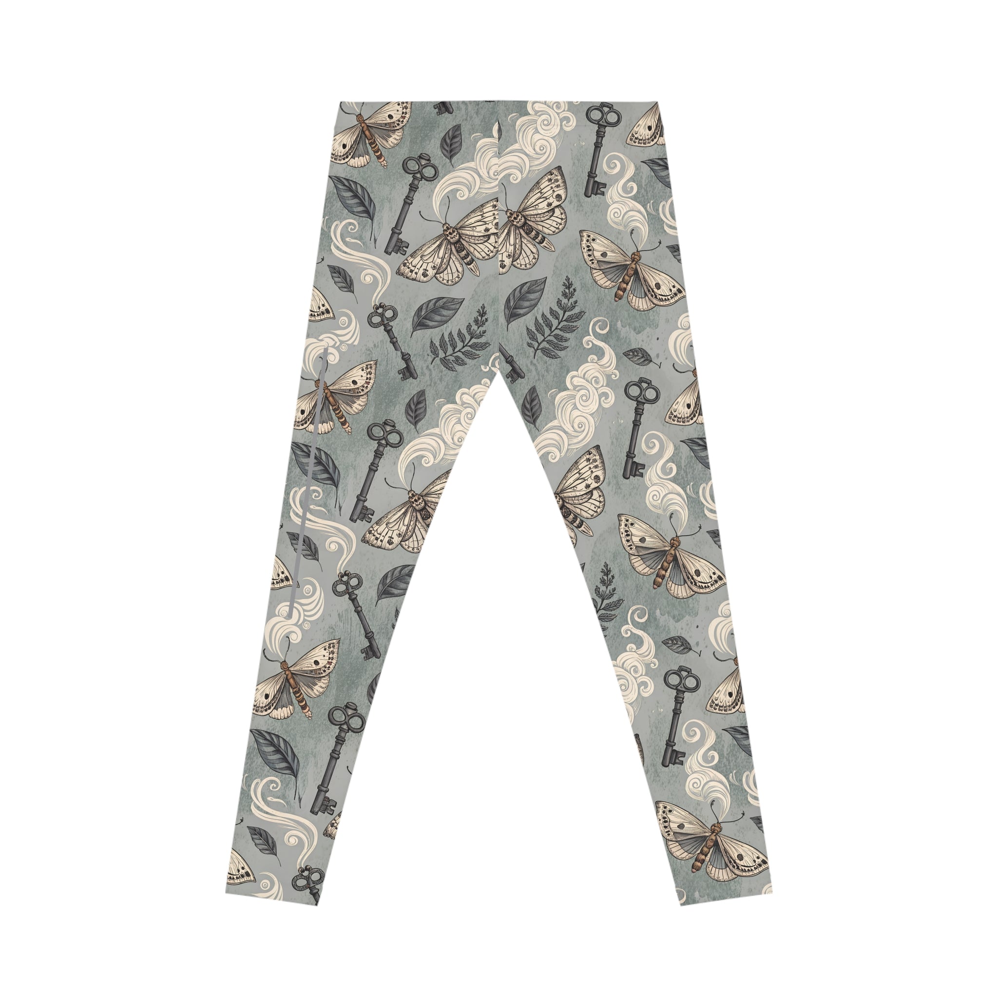 Leggings with a pattern of keys, moths, and leaves on a light grey background