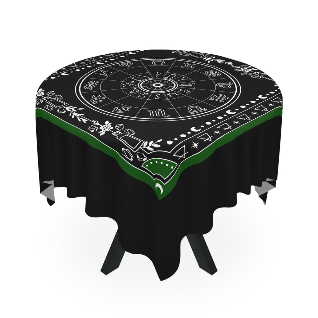 Decorative tablecloth with astrological symbols on a black background