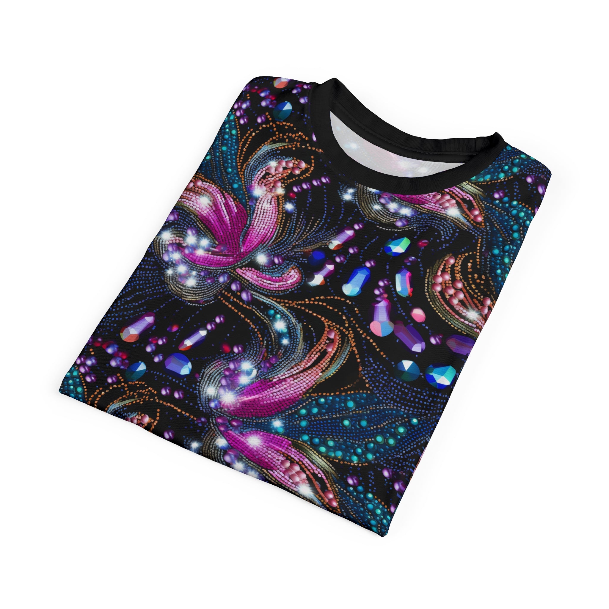 Folded colorful abstract patterned shirt on a white background