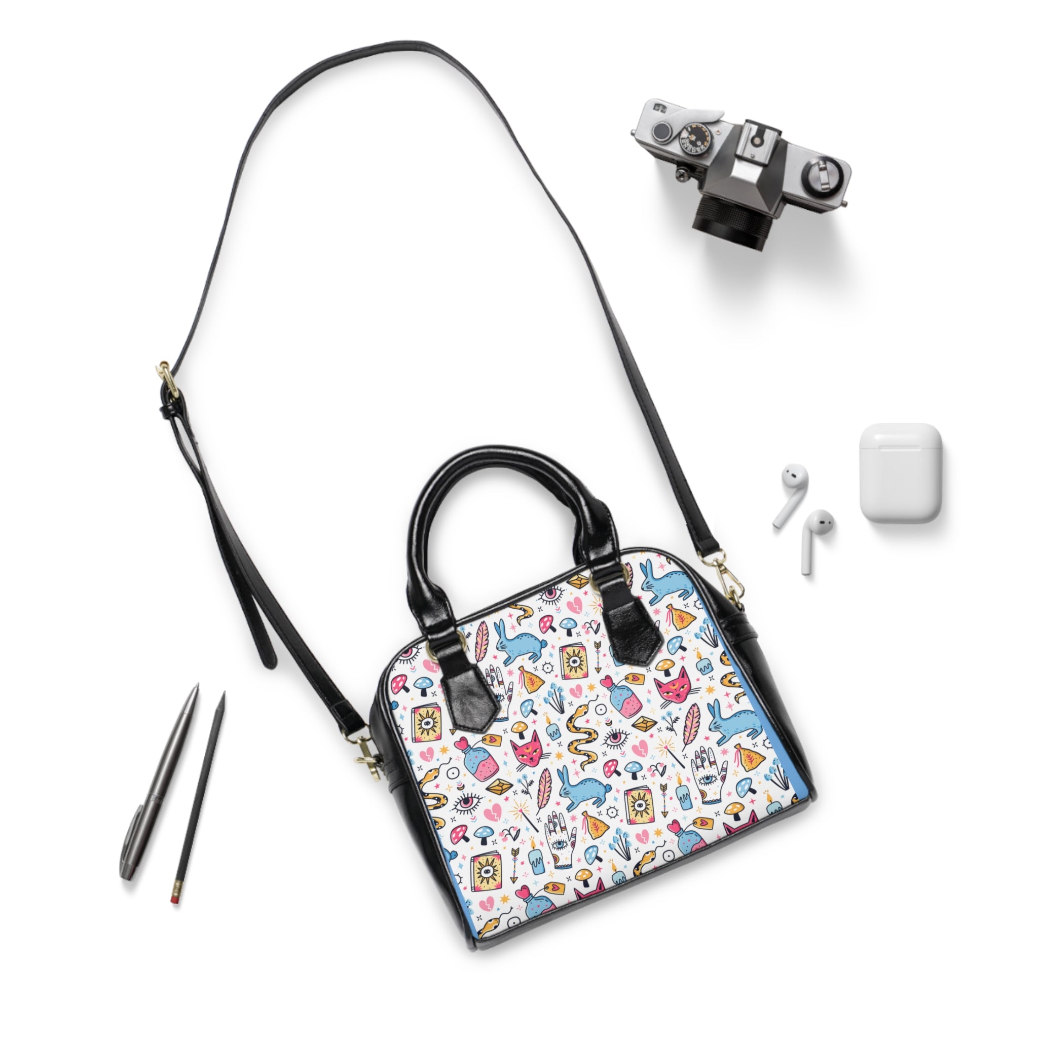 Handbag with magic  pattern on a white background