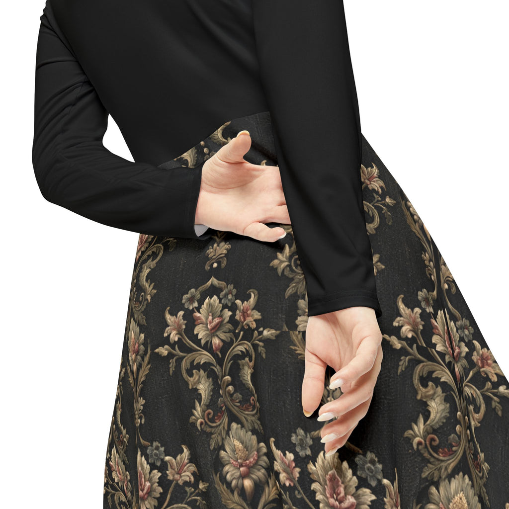 Close up of a black Victorian print dress on a white background