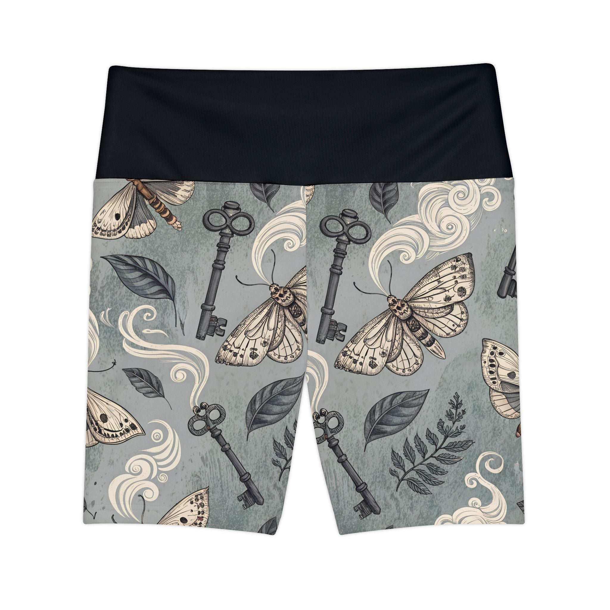 Shorts with vintage-style key and moth pattern on a gray background