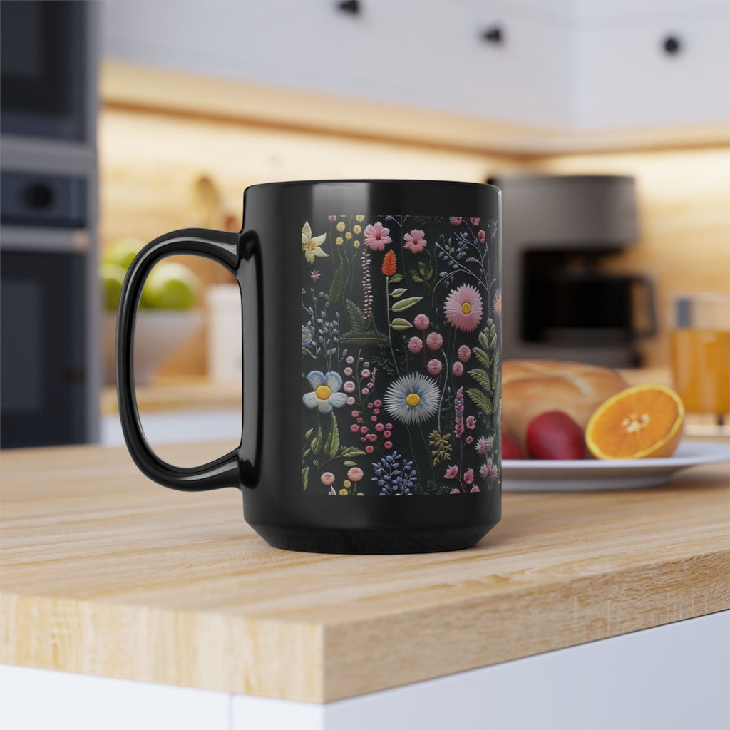 Black mug with floral design on a kitchen counter