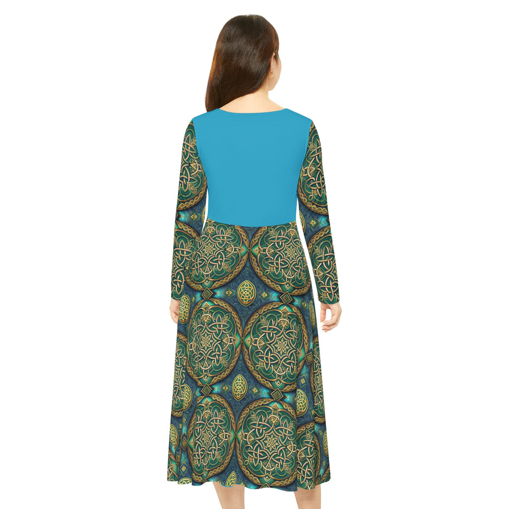Woman wearing a blue and green patterned dress on a white background