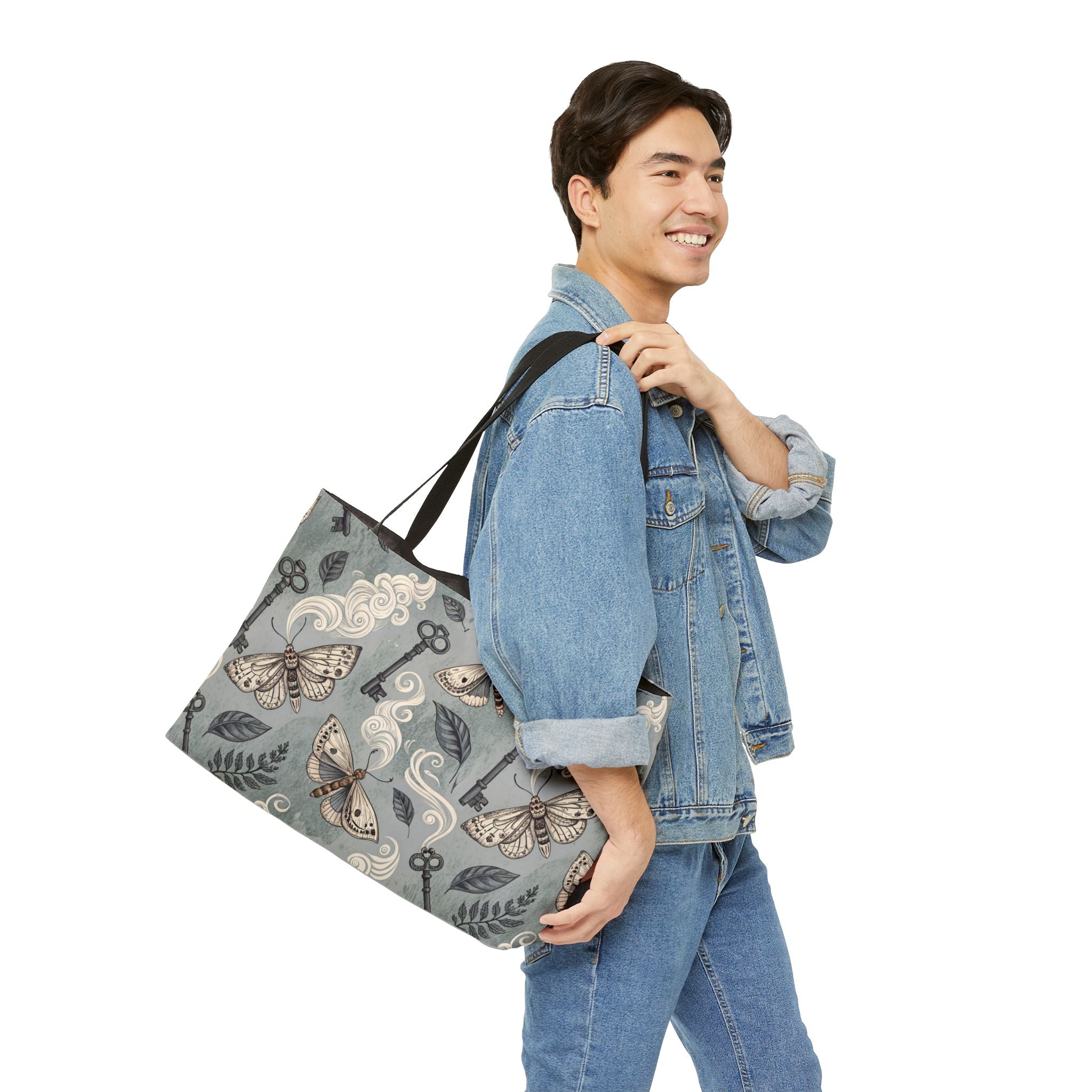 Man carrying a patterned tote bag on a white background
