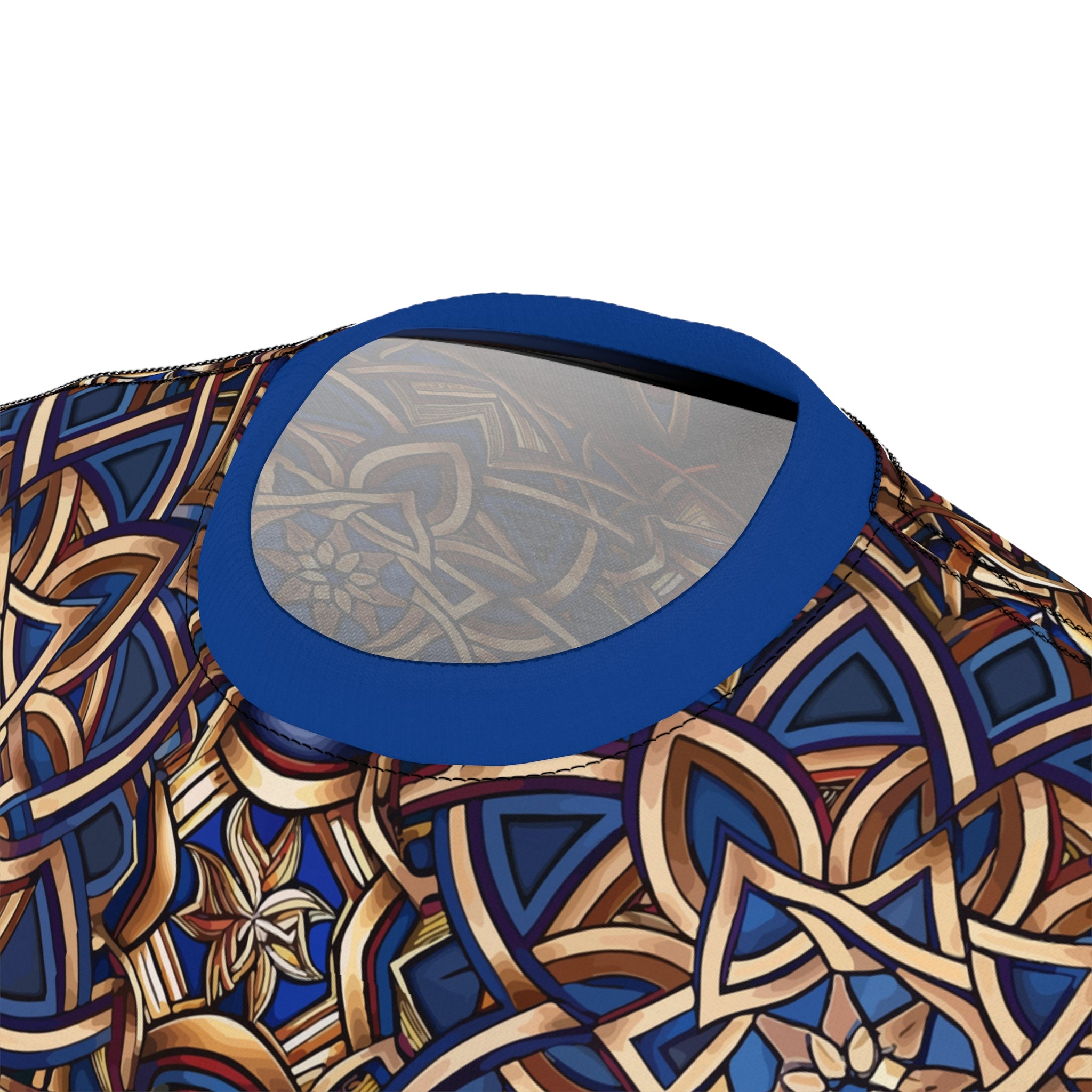 Close-up of a patterned product with blue and gold design on a white background