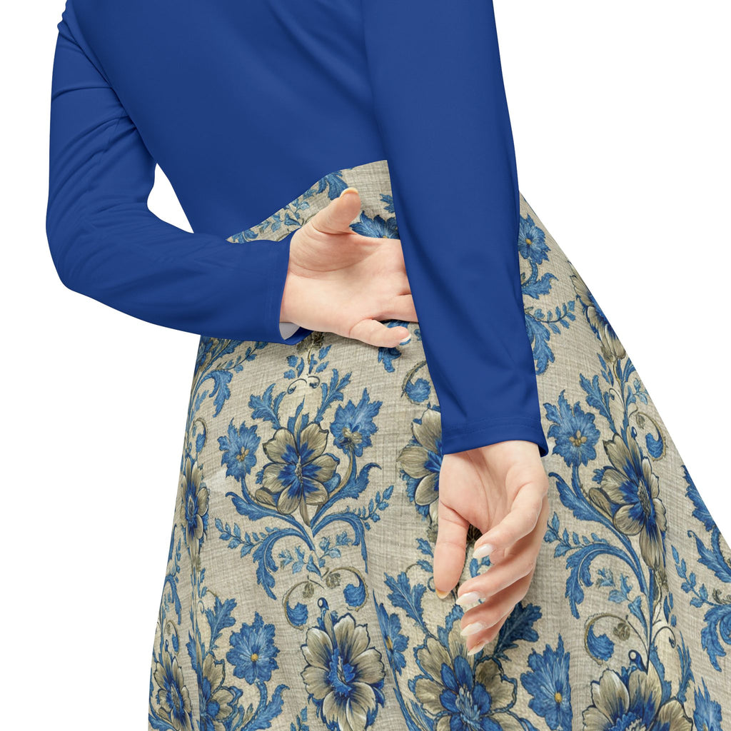 Close up of a blue Victorian print dress on a white background