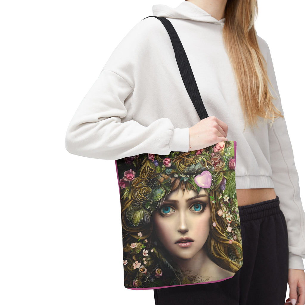 Tote bag with a design of a woman's face surrounded by flowers and leaves
