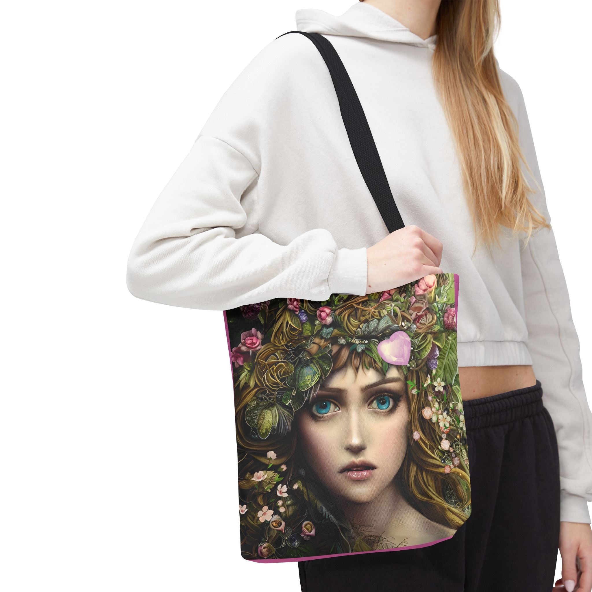 Tote bag with a design of a woman's face surrounded by flowers and leaves