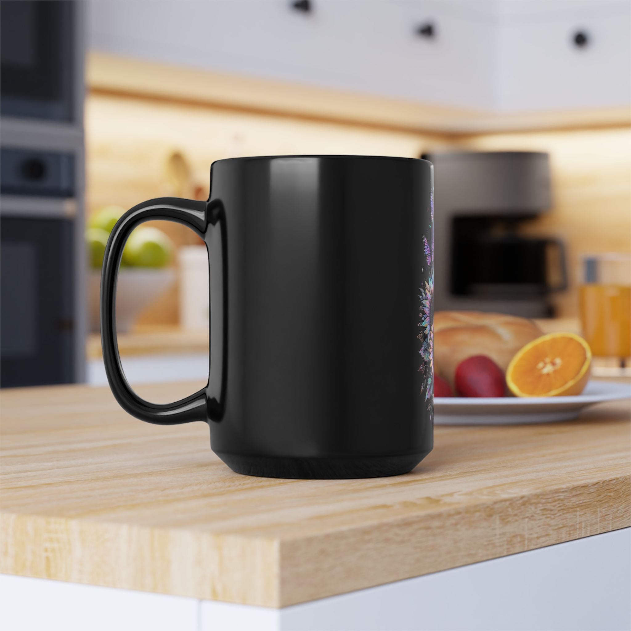 Black mug on a kitchen counter with a blurred background