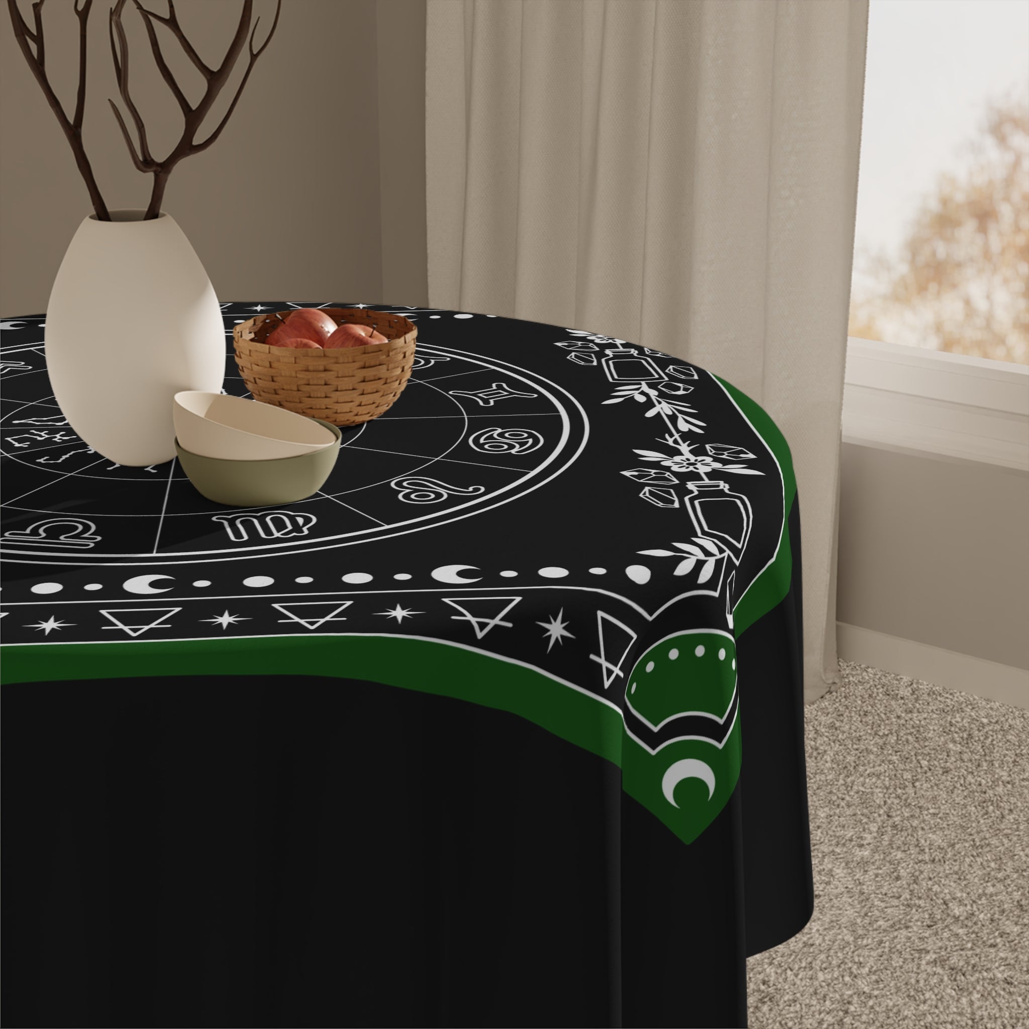Close up of a Decorative tablecloth with astrological symbols on a black background
