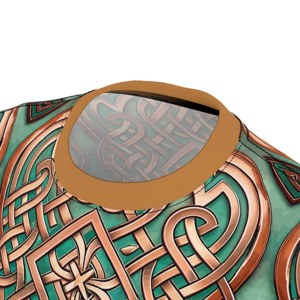 Close up of a t-shirt collar with an intricate Celtic knot patterns on a white background