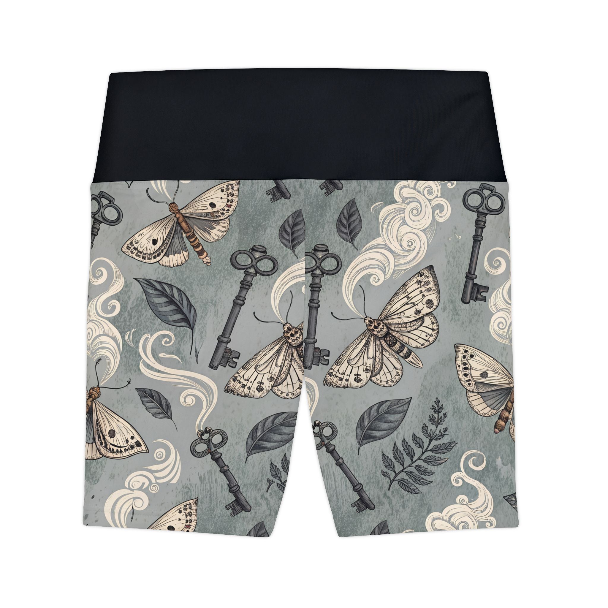 Shorts with vintage-style key and moth pattern on a gray background