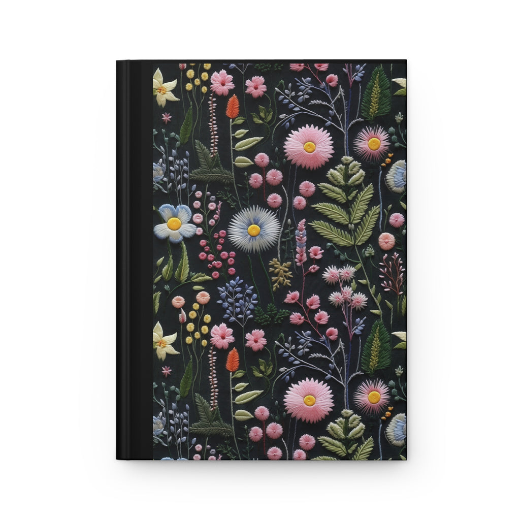 Notebook with a floral design on a black background