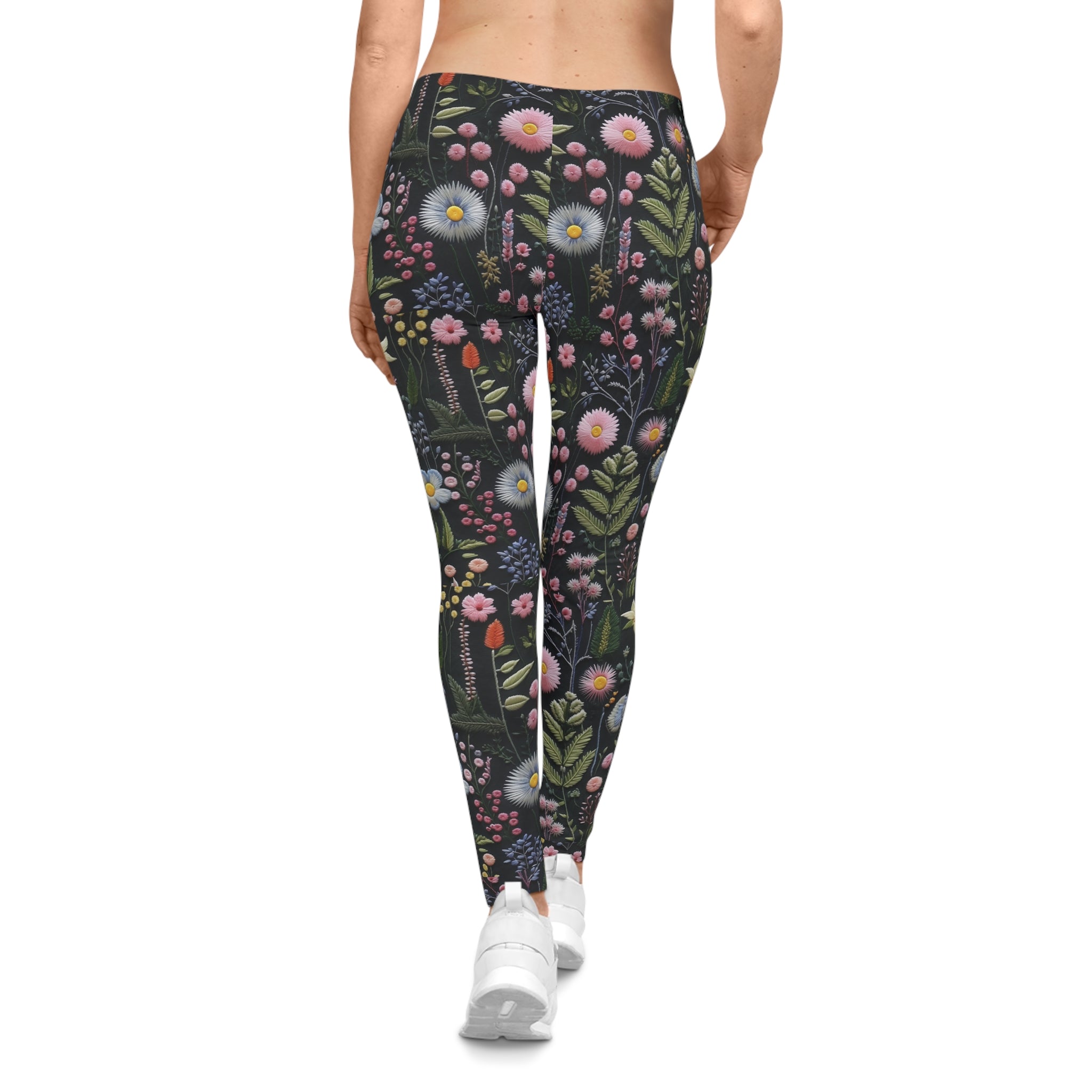 Leggings with floral pattern worn by a person on a white background