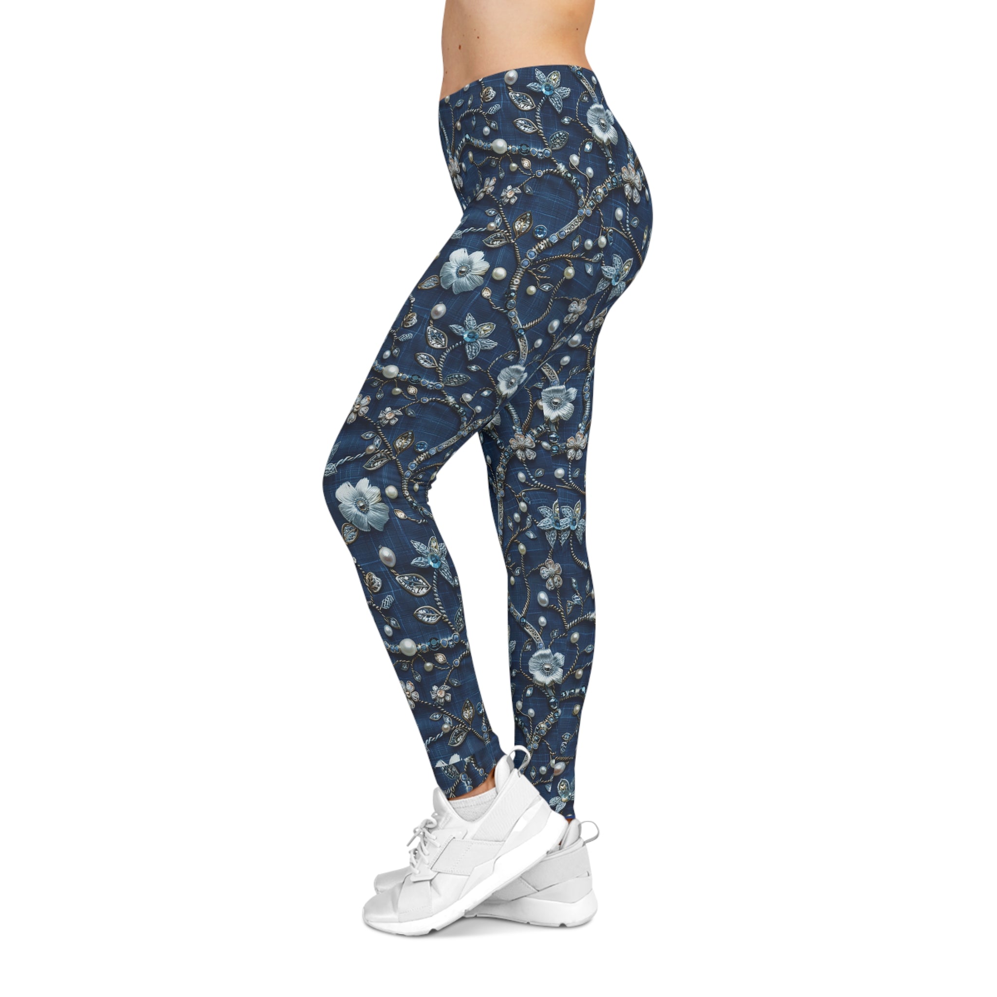 Blue floral leggings worn by a person on a white background