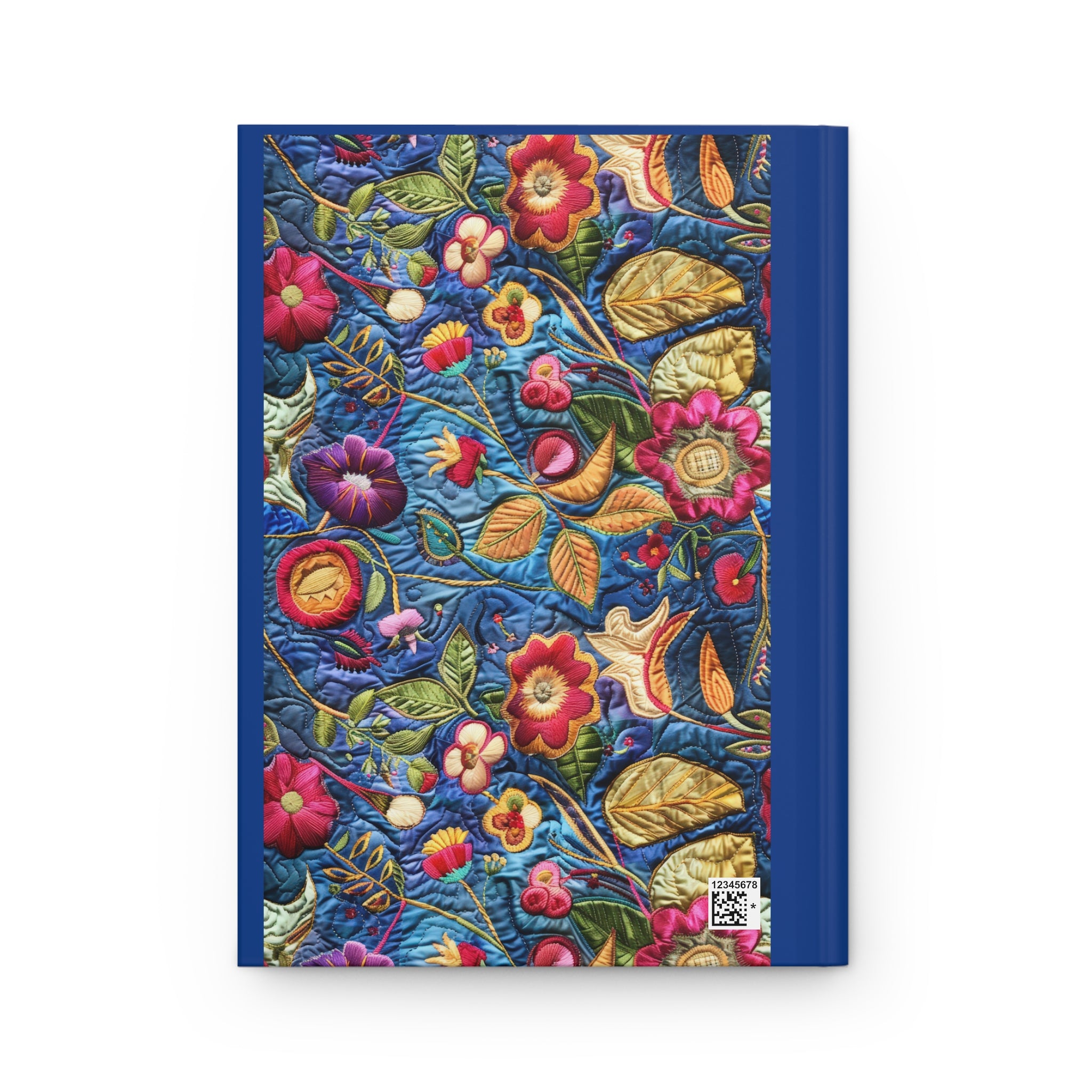 Notebook with floral embroidery design on a white background
