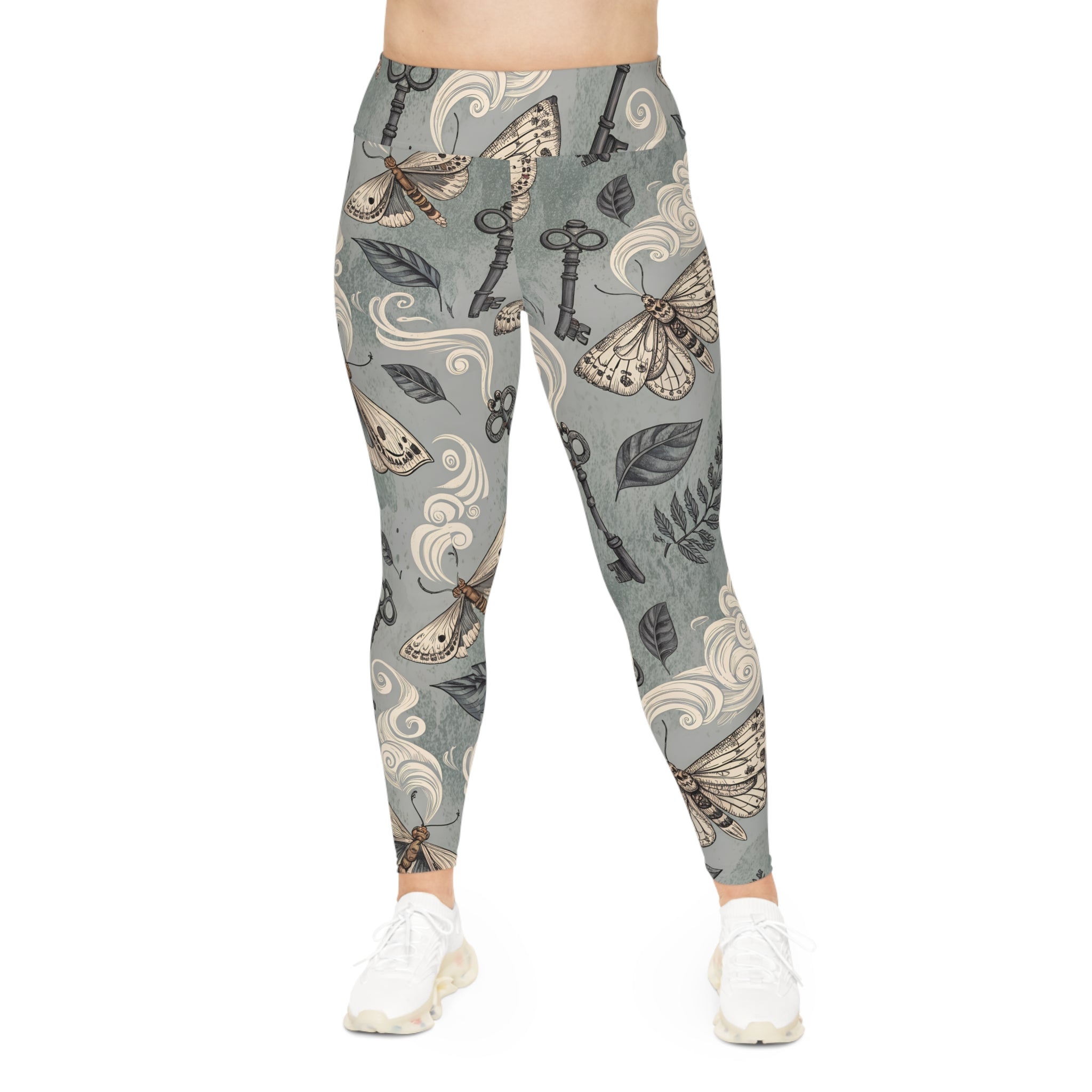 Leggings with moth and key pattern on a gray background
