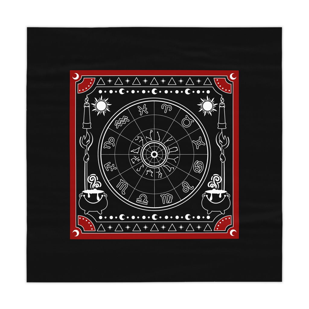 Decorative tablecloth with astrological symbols on a black background