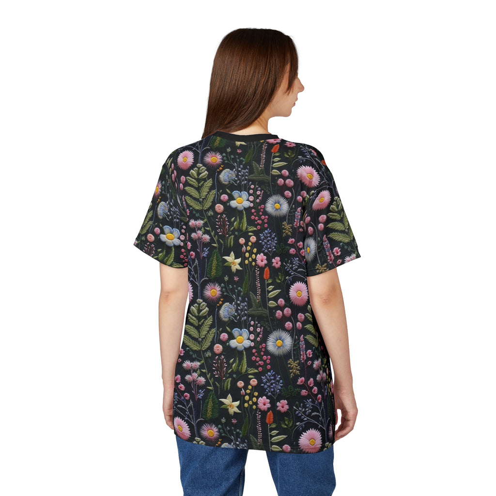 Woman wearing a floral-patterned shirt on a white background