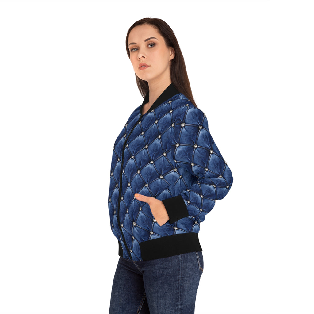 Model wearing  a blue faux tufted bomber jacket on a white background.