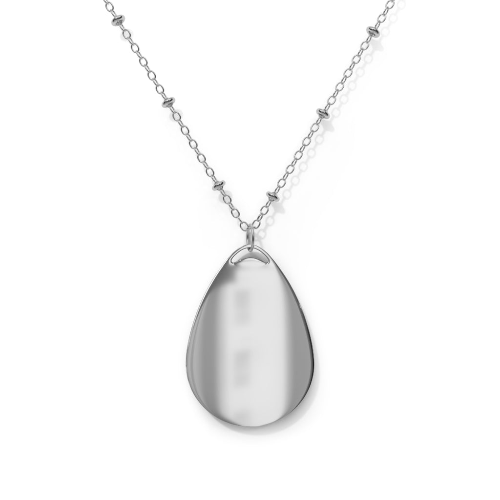 Back of silver drop pendant necklace on a white background