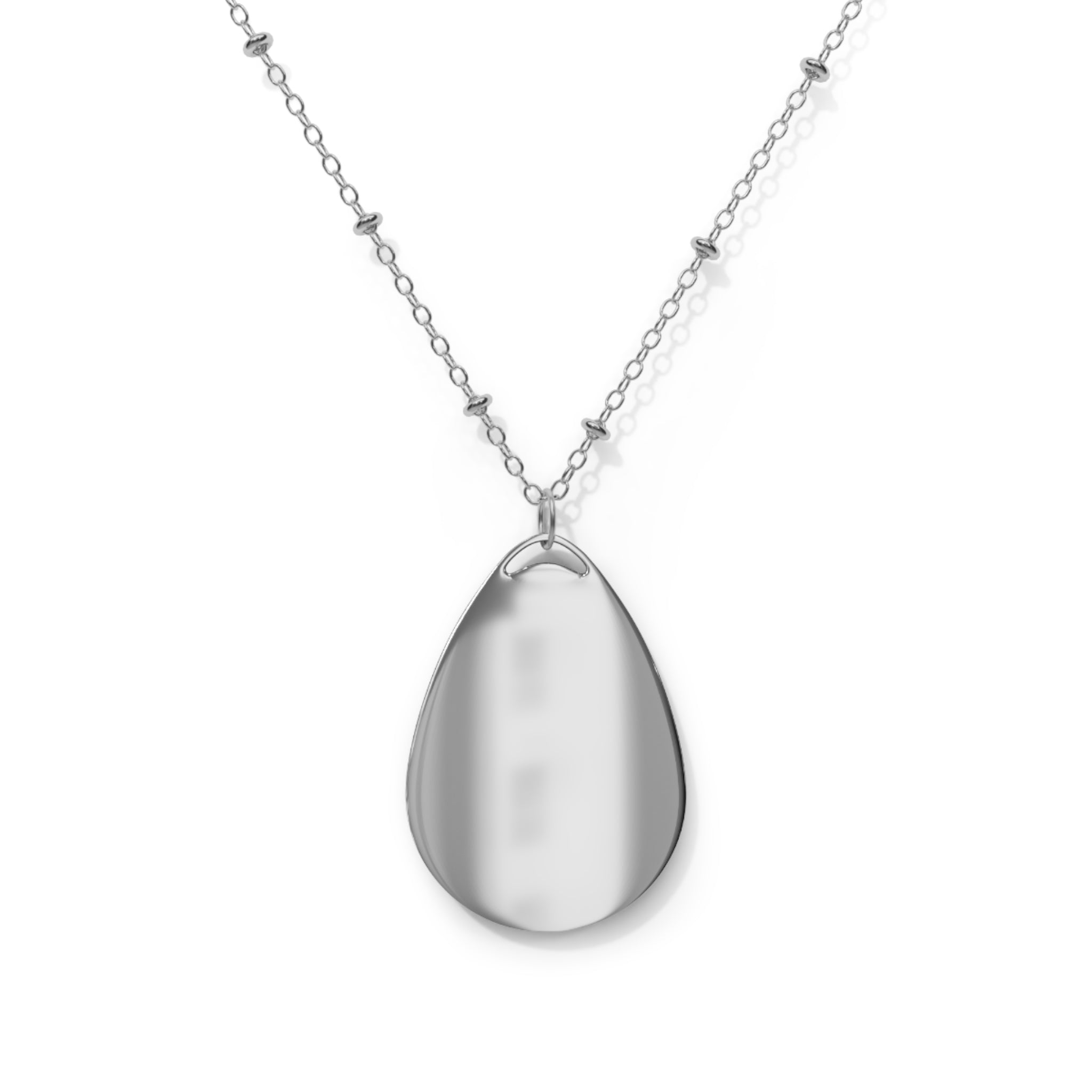 Back of silver drop pendant necklace on a white background