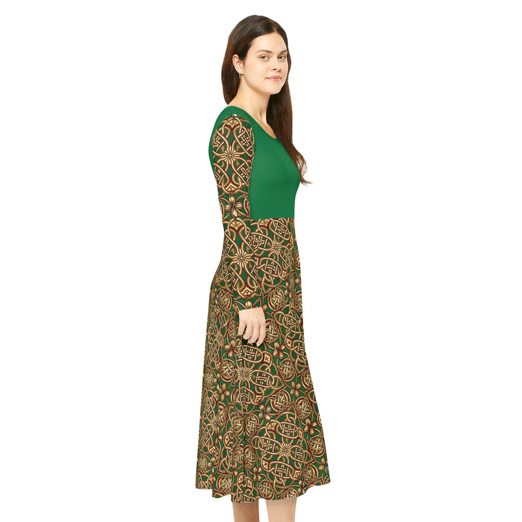 Woman wearing a green and patterned dress on a white background