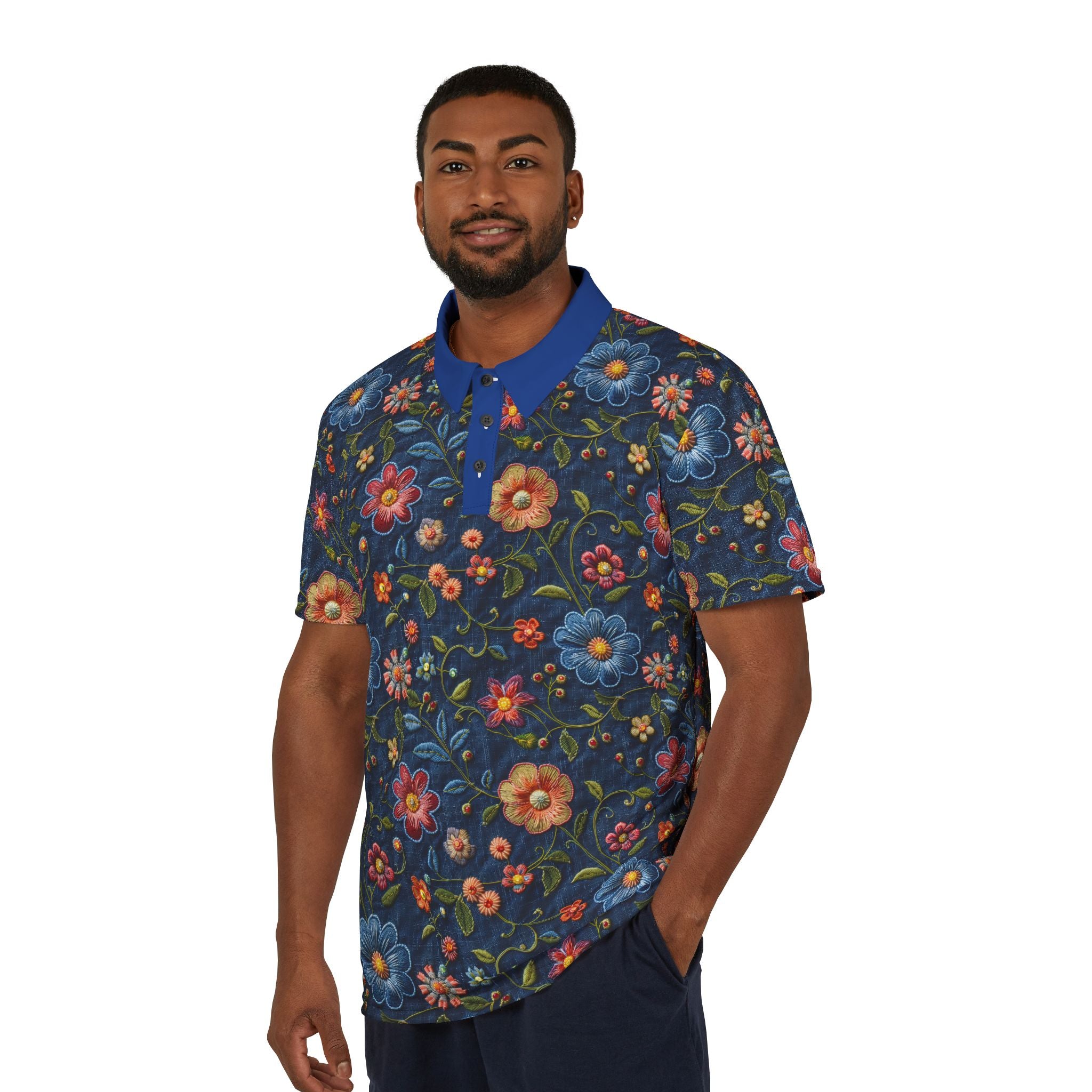 Man wearing a colorful floral-patterned shirt on a white background