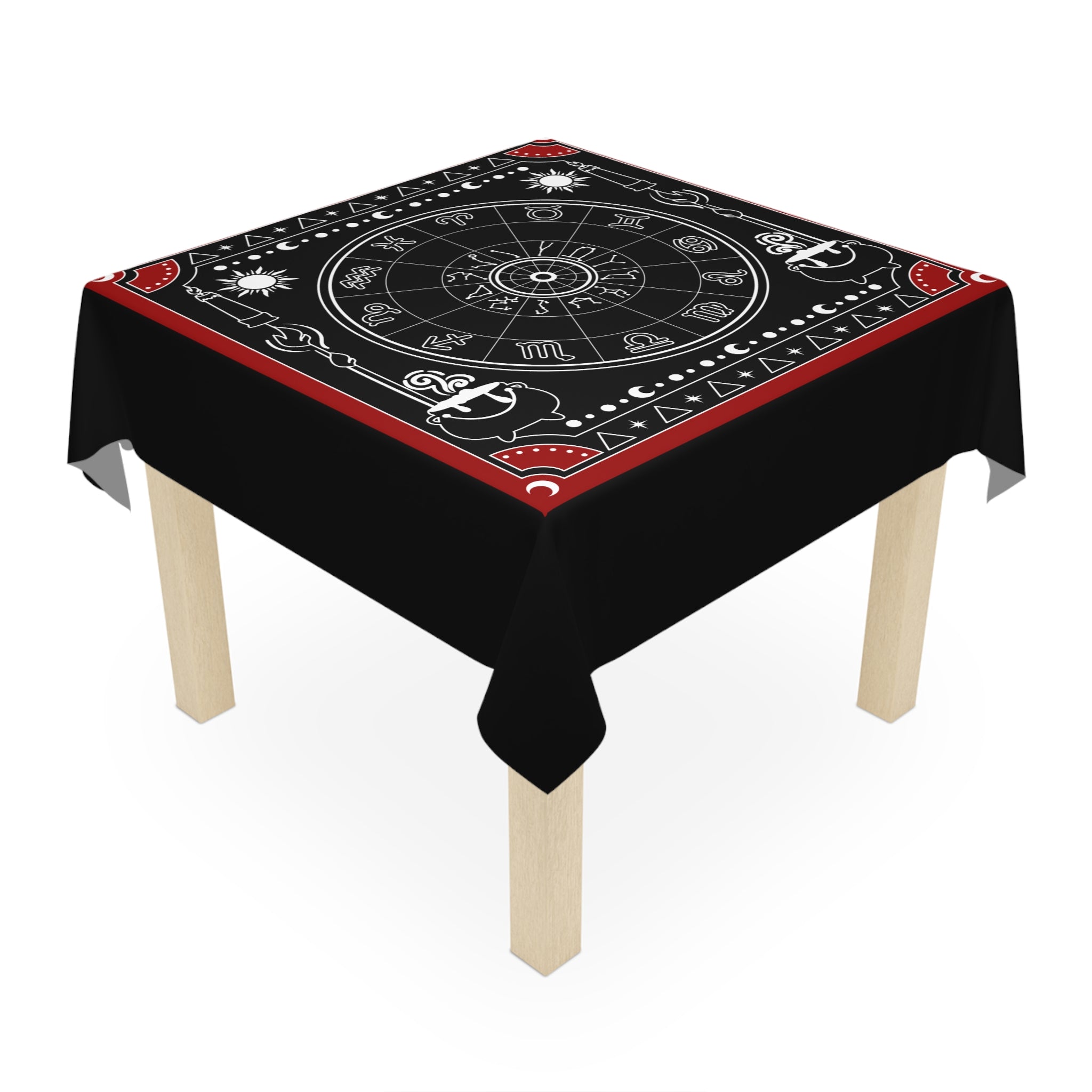 Decorative tablecloth with astrological symbols on a black background
