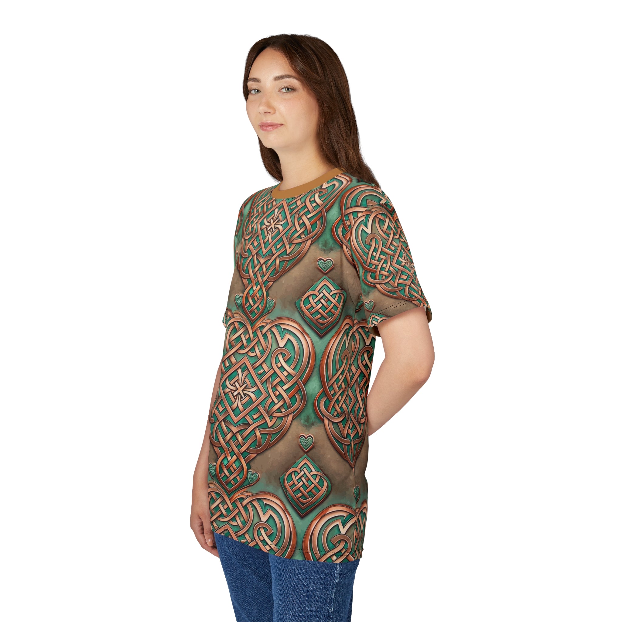 Woman wearing a t-shirt with  an intricate Celtic knot patterns on a white background