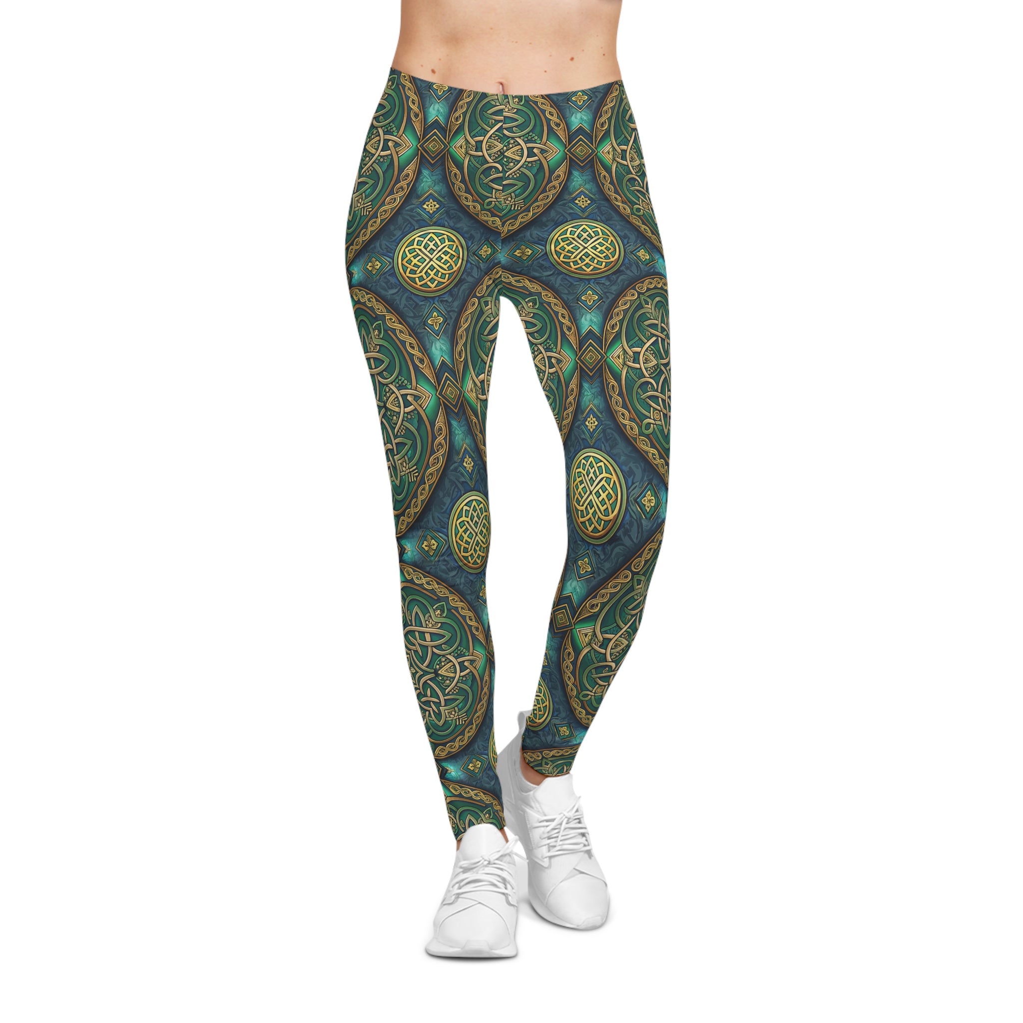 Leggings with a Celtic green and gold pattern worn by a person on a white background