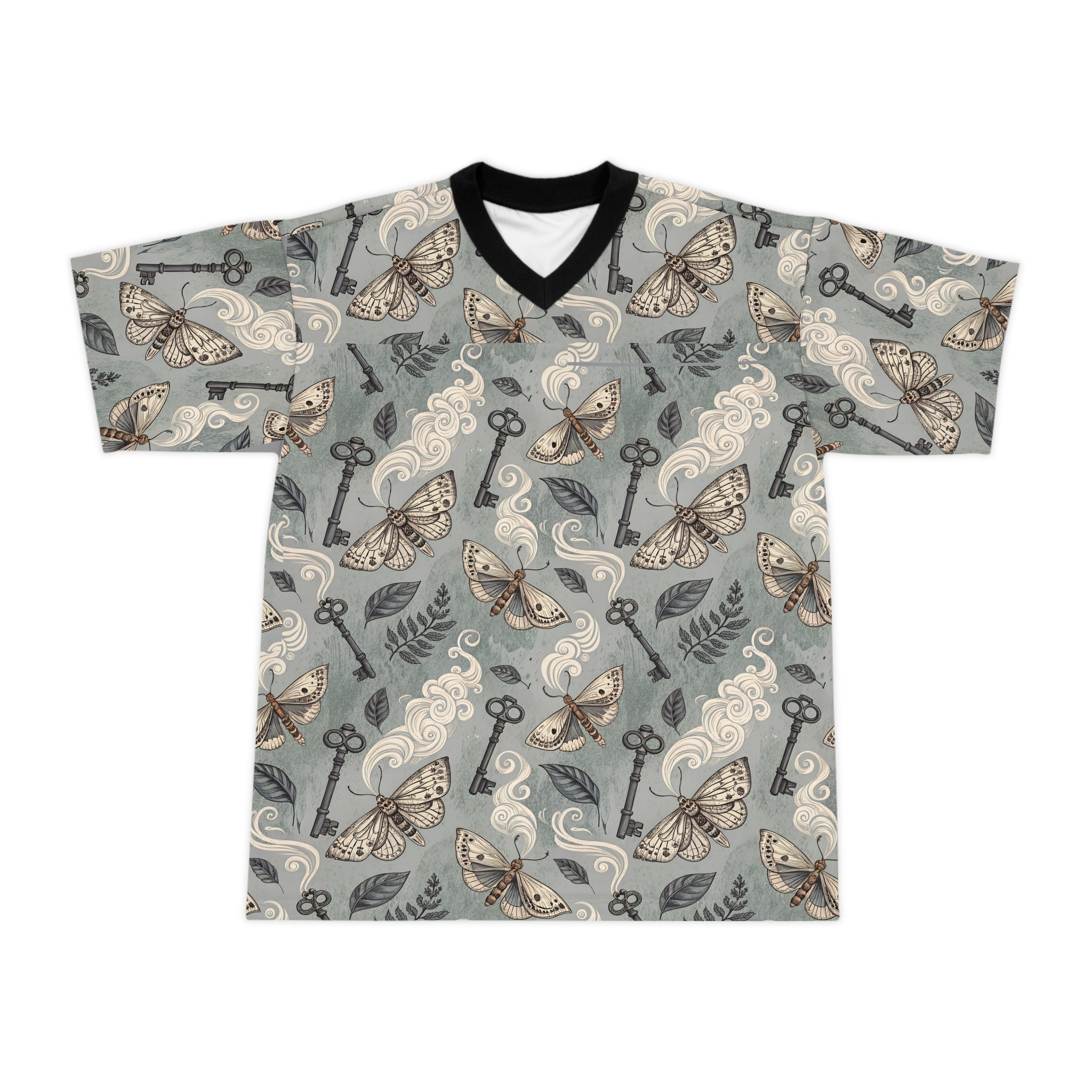 T-shirt with butterfly and key pattern on a gray background